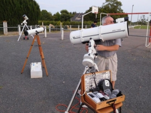 Amateur astronomy using a telescope.